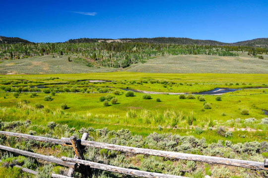 fence and scenic hills