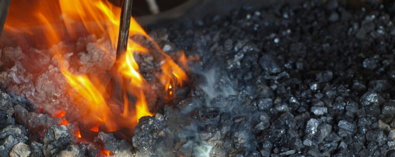 hot branding coals with fire