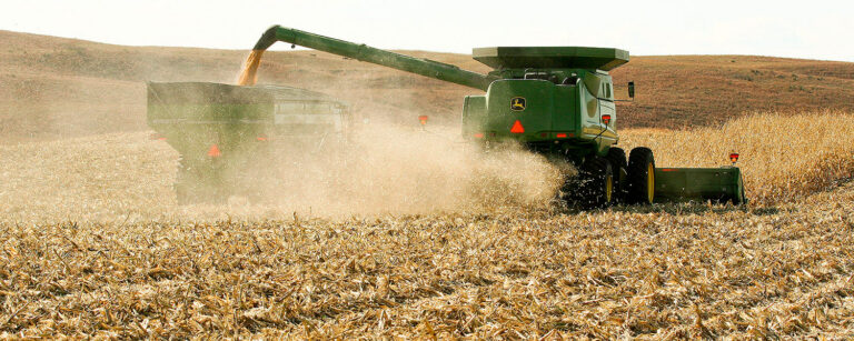 harvesting combine going to work