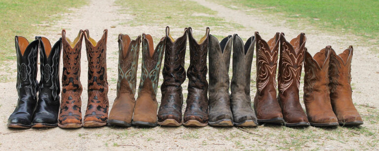 cowboy boots lined up on road