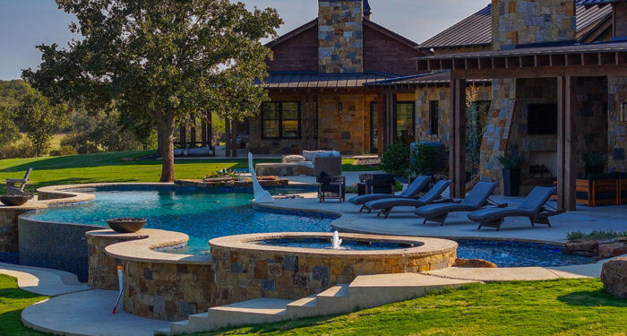 main house with sauna and pool in foreground