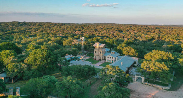 Overview of the main ranch homestead amongst trees