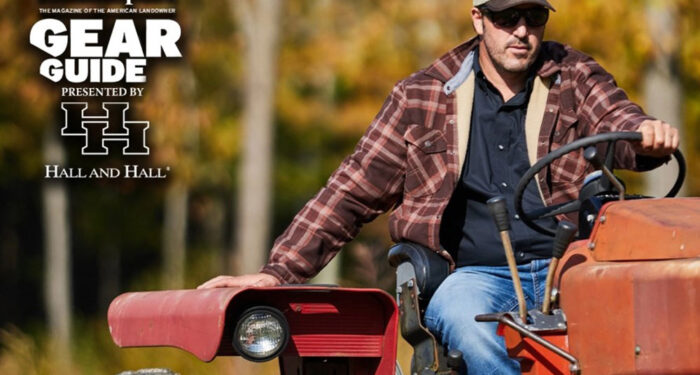 Gustav photo - man on red tractor wearing Wrangler jeans