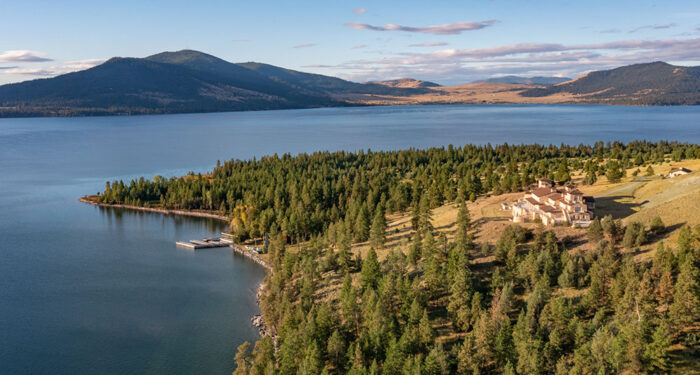 overview of mansion on island with lake and distant hills and other islands