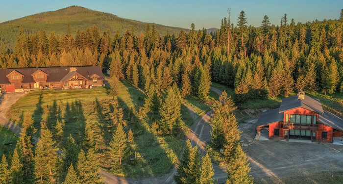 lodge and barndominum on forest property